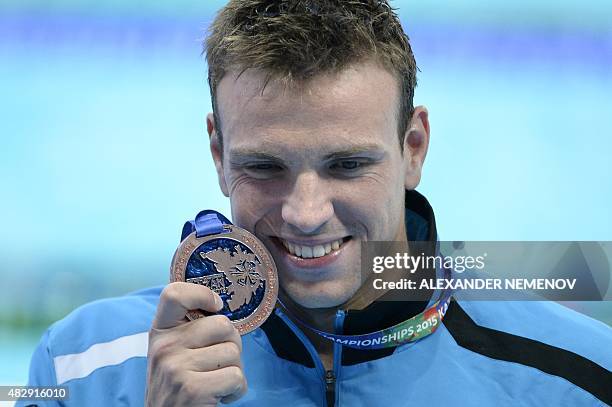 Germany's Paul Biedermann, bronze, poses during the podium ceremony of the men's 200m freestyle swimming event at the 2015 FINA World Championships...