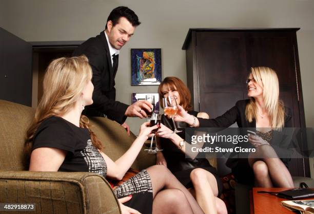 co-workers celebrating after business day - pre party stock pictures, royalty-free photos & images