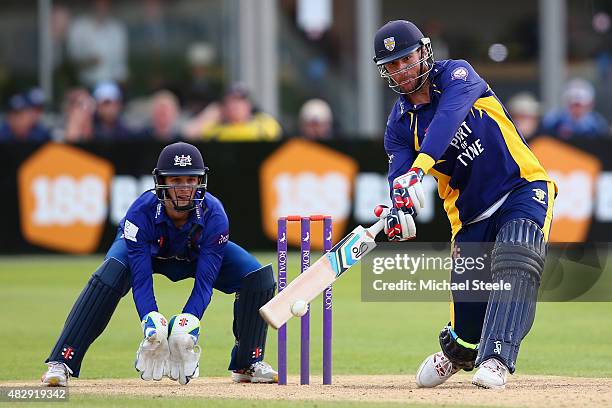 John Hastings of Durham hits out off the bowling of David Payne as wicketkeeper Gareth Roderick looks on during the Royal London One Day Cup Group A...