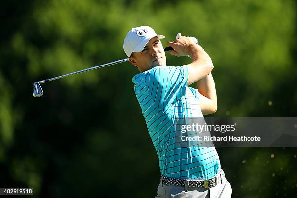 Jordan Spieth of the USA hits a shot during a practice round for the World Golf Championship - Bridgestone Invitational at Firestone Coutry Club on...