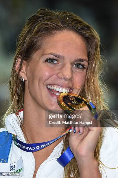 Gold medallist Yuliya Efimova of Russia poses during the medal ceremony for the Women's 100m Breaststroke Final on day eleven of the 16th FINA World...