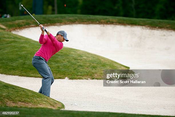 Sergio Garcia of Spain hits his ball out of the bunker on the eighth hole during round three of the Shell Houston Open at the Golf Club of Houston on...