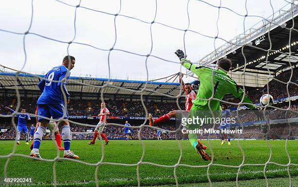 Mohamed Salah of Chelsea scores the opening goal past Asmir Begovic of Stoke City during the Barclays Premier League match between Chelsea and Stoke...