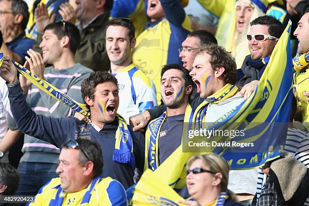 Clermont Auvergne fans celebrate victory during the Heineken Cup quarter final match between Clermont Auvergne and Leicester Tigers at Stade Marcel...