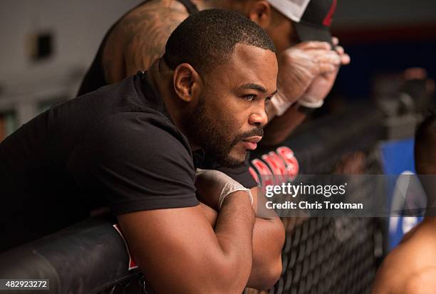 Blackzilian's teammate Rashad Evans watches as Vicente Luque enters the Octagon before facing Hayder Hassan during the filming of The Ultimate...