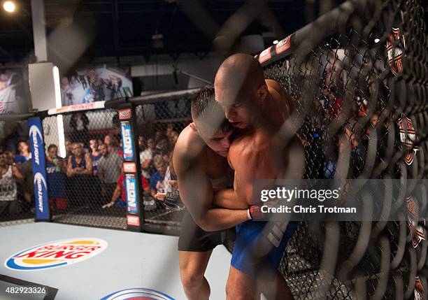 Vicente Luque pushes Hayder Hassan up against the cage during the filming of The Ultimate Fighter: American Top Team vs Blackzilians on February 27,...