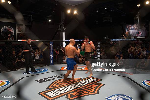 Vicente Luque circles Hayder Hassan during the filming of The Ultimate Fighter: American Top Team vs Blackzilians on February 27, 2015 in Coconut...