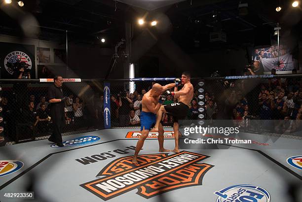 Hayder Hassan punches Vicente Luque during the filming of The Ultimate Fighter: American Top Team vs Blackzilians on February 27, 2015 in Coconut...