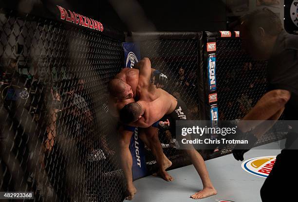 Vicente Luque pushes Hayder Hassan up against the cage during the filming of The Ultimate Fighter: American Top Team vs Blackzilians on February 27,...