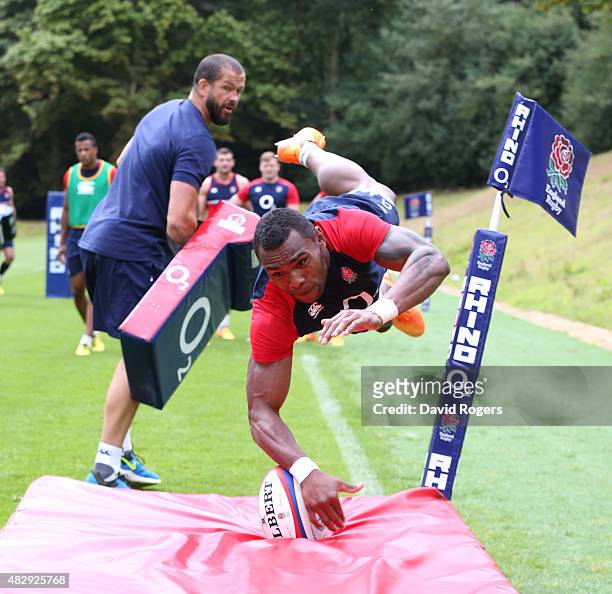 Semesa Rokoduguni dives in the corner as he practices his try scoring technique during the England training session held at Pennyhill Park on August...