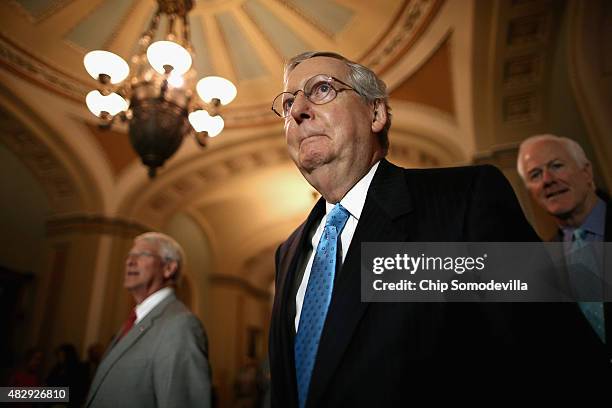 Senate Majority Leader Mitch McConnell , Sen. Roger Wicker and Sen. John Cornyn prepare to speak to reporters after the weekly Senate Republican...
