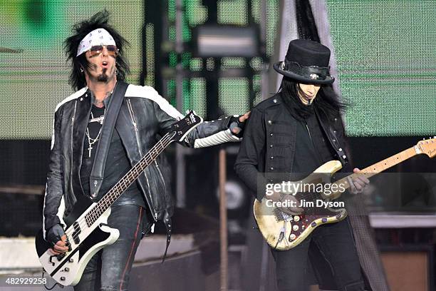 Nikki Sixx and Mick Mars of Motley Crue perform live on stage on Day 3 of the Download Festival at Donington Park on June 14, 2015 in Castle...