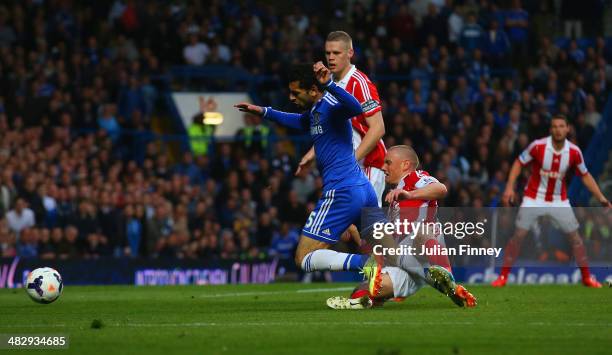 Mohamed Salah of Chelsea is fouled in the area by Andy Wilkinson of Stoke City during the Barclays Premier League match between Chelsea and Stoke...