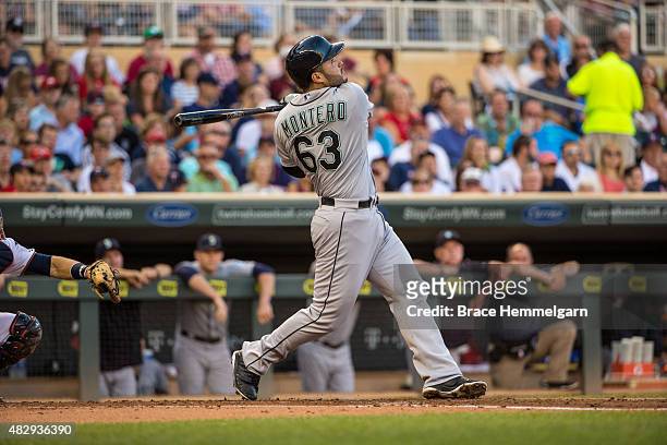 Jesus Montero of the Seattle Mariners bats against the Minnesota Twins on July 31, 2015 at Target Field in Minneapolis, Minnesota. The Mariners...