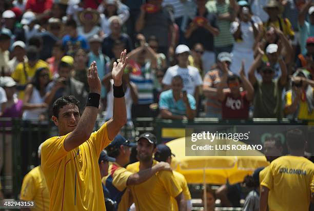 Colombian tennis player Robert Farah celebrates after winning against Dominican Republic's tennis team during their Davis Cup Americas Group I second...