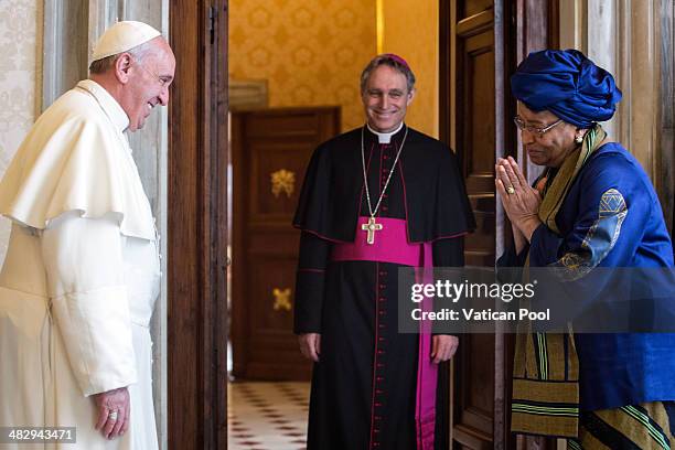 Pope Francis and Prefect of the Pontifical House and former personal secretary of Pope Benedict XVI, Georg Ganswein, meet President of Liberia Ellen...