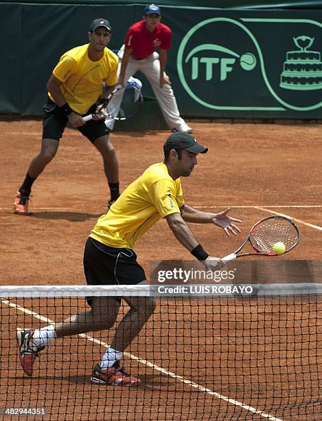 Colombian tennis player Juan Sebastian Cabal and teammate Robert Farah face Dominican Republic's tennis players Jose Hernandez and Victor Estrella...