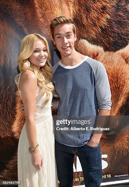 Actors Olivia Holt and Austin North attend the Disneynature "Bears" special screening at the Walt Disney Studios Main Theatre on April 5, 2014 in...