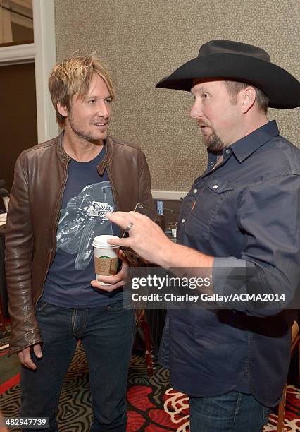 Recording artists Keith Urban and Tate Stevens backstage at the Cumulus/Westwood One Radio Remotes during the 49th Annual Academy of Country Music...