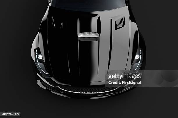 schwarz sport auto auf dunklem hintergrund - polish car stock-fotos und bilder