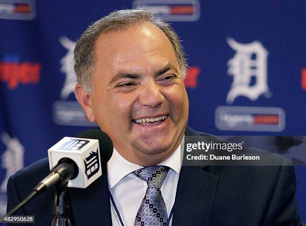 Al Avila laughs during a news conference at Comerica Park after he was promoted to executive vice president of baseball operations and general...