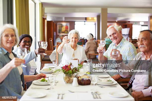 here's to retirement! - dining stock pictures, royalty-free photos & images