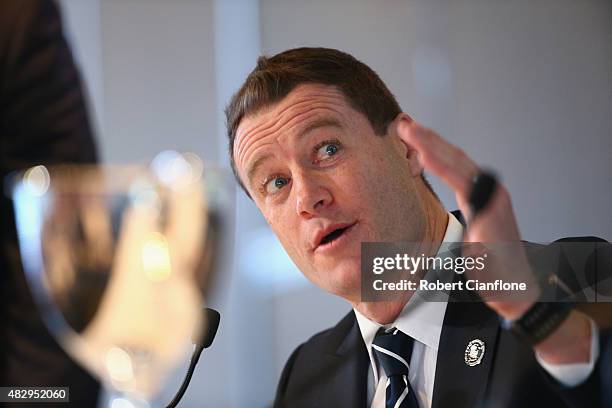 Carlton coach John Barker speaks during the Peter Mac Cup Breakfast at the Melbourne Cricket Ground on August 5, 2015 in Melbourne, Australia.