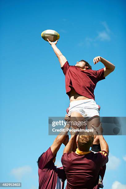 capturing an epic moment - rugby ball stockfoto's en -beelden