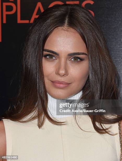 Model Xenia Deli arrives at the premiere of DIRECTV's 'Dark Places' at Harmony Gold Theatre on July 21, 2015 in Los Angeles, California.