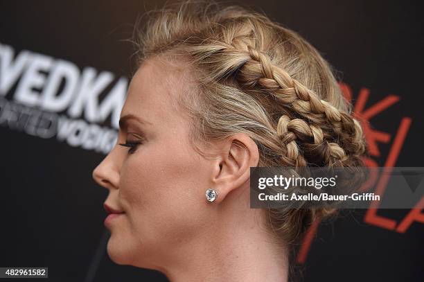 Actress Charlize Theron arrives at the premiere of DIRECTV's 'Dark Places' at Harmony Gold Theatre on July 21, 2015 in Los Angeles, California.