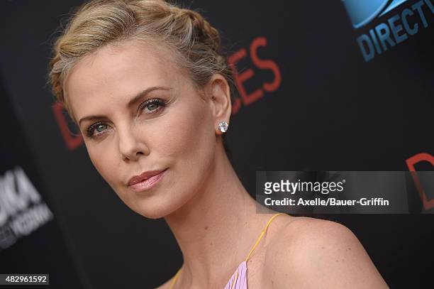 Actress Charlize Theron arrives at the premiere of DIRECTV's 'Dark Places' at Harmony Gold Theatre on July 21, 2015 in Los Angeles, California.