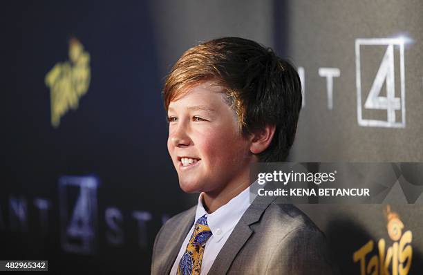 Owen Judge poses for a picture as he attends the "Fantastic Four" premiere in Brooklyn, New York on August 04, 2015. AFP PHOTO / KENA BETANCUR