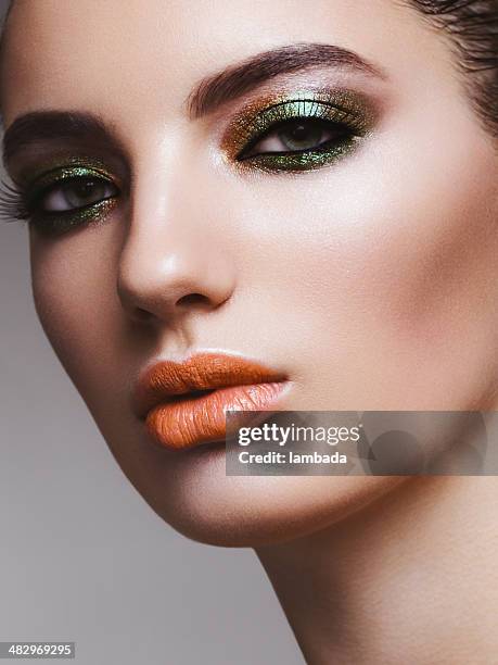 beautiful woman with bright make-up - eyeshadow stock pictures, royalty-free photos & images