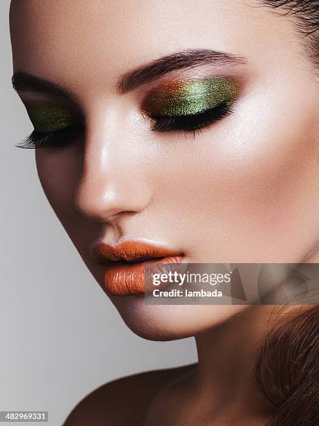 beautiful woman with bright make-up - eyeshadow stock pictures, royalty-free photos & images