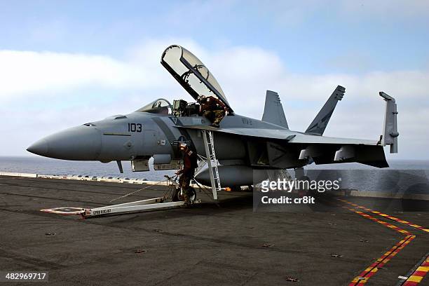 servicing an fa18 superhornet - aircraft maintenance stock pictures, royalty-free photos & images