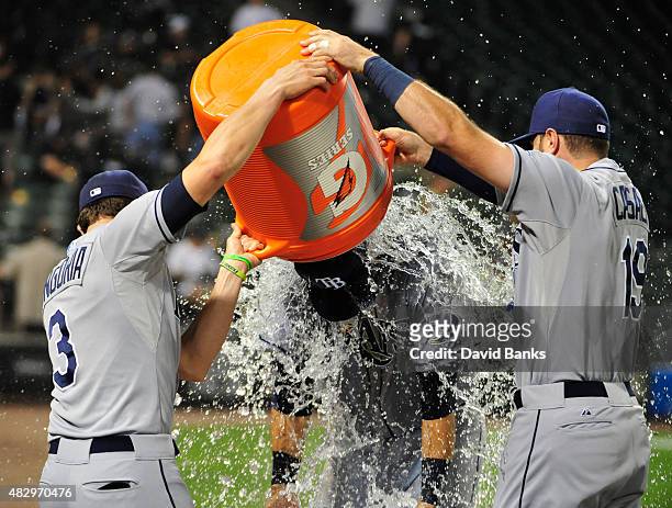 Evan Longoria of the Tampa Bay Rays Curt Casali give Richie Shaffer a gatorade bath after he had his first MLB hit against the Chicago White Sox on...