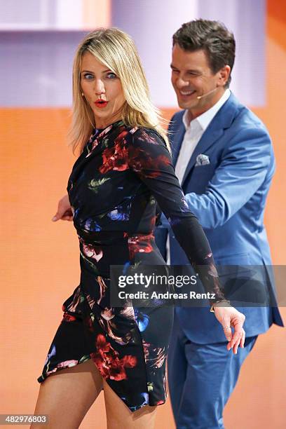 Host Markus Lanz and Cameron Diaz talk on stage during the 'Wetten, dass..?' tv show on April 5, 2014 in Offenburg, Germany.