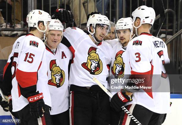 Zack Smith, Chris Neil, Mika Zibanejad, Erik Karlsson and Marc Methot of the Ottawa Senators celebrate after Zibanejad scored the second goal against...