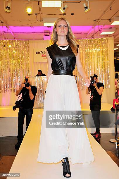 Model walks runway in prom wear during Mack Wilds visit at Macy's Herald Square on April 5, 2014 in New York City.