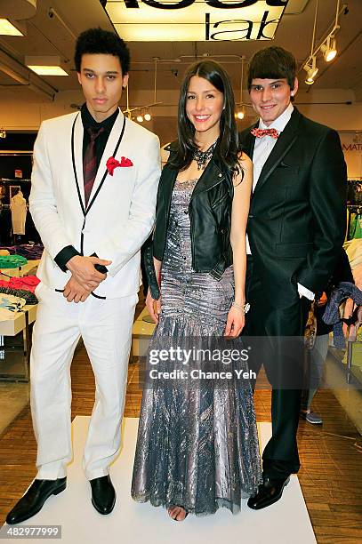 Models pose during the prom wear presentation for Mack Wild's visit at Macy's Herald Square on April 5, 2014 in New York City.