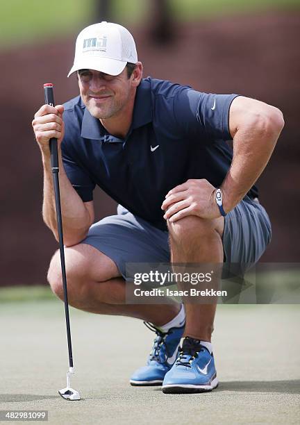 Player Aaron Rodgers lines up a putt during Aria Resort & Casino's 13th Annual Michael Jordan Celebrity Invitational at Shadow Creek on April 5, 2014...