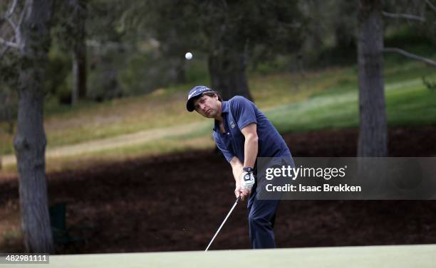 Actor Ray Romano chips onto the green during Aria Resort & Casino's 13th Annual Michael Jordan Celebrity Invitational at Shadow Creek on April 5,...