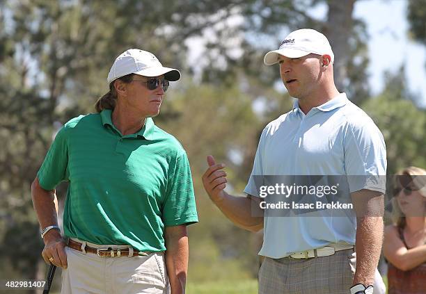 Former Olympian and television personality Bruce Jenner and former NFL player Brian Urlacher chat during Aria Resort & Casino's 13th Annual Michael...