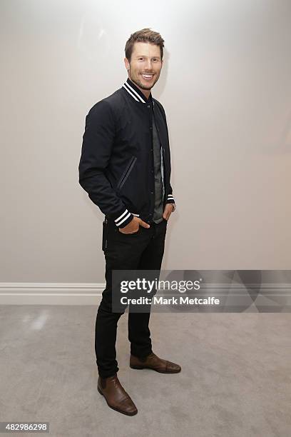 Model Jason Dundas poses backstage ahead of the David Jones Spring/Summer 2015 Fashion Launch at David Jones Elizabeth Street Store on August 5, 2015...