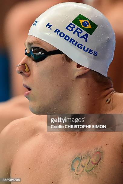 Brazil's Henrique Rodrigues reacts after the preliminary heats of the men's 200m individual medley swimming event at the 2015 FINA World...