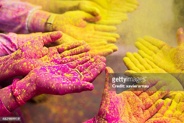 mani di preghiera - holi festival and indian person foto e immagini stock
