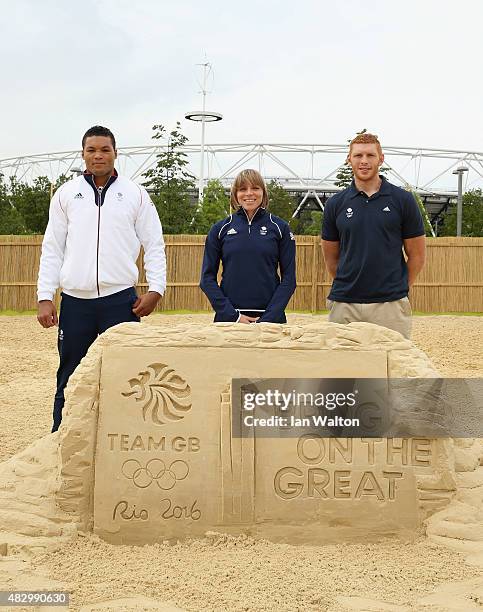 Joe Joyce, Kate Richardson Walsh and James Rodwell pose for photographers to celebrate one year to go until the Rio 2016 Olympic Games at Beach East,...