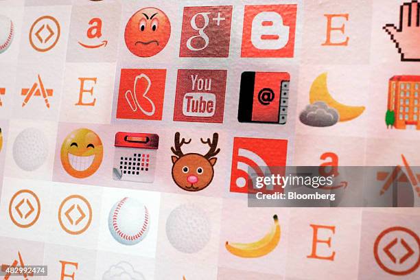 Internet app logos sit on display inside a Euskaltel SA phone store in Barakaldo, Spain, on Tuesday, Aug. 4., 2015. Euskaltel, the phone and...