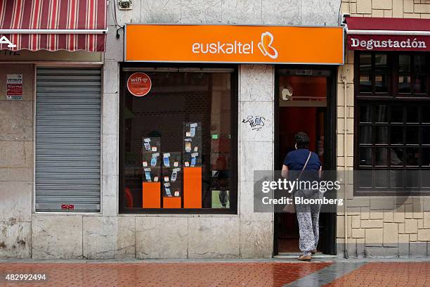Customer enters a Euskaltel SA phone store in Barakaldo, Spain, on Tuesday, Aug. 4., 2015. Euskaltel, the phone and broadband carrier that operates...