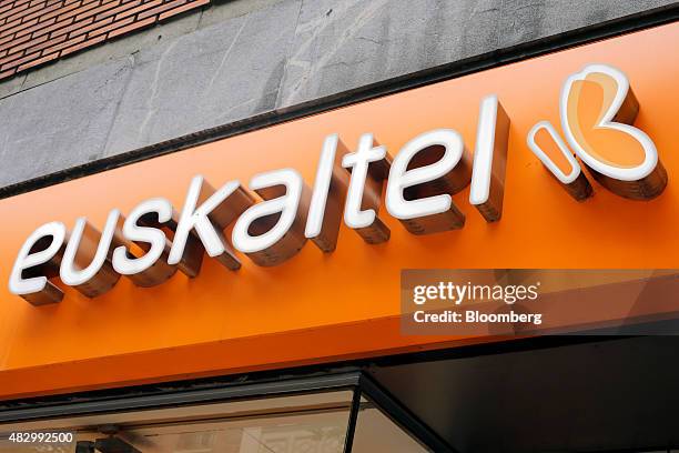 Euskaltel logo sits on display outside a Euskaltel SA phone store in Bilbao, Spain, on Tuesday, Aug. 4., 2015. Euskaltel, the phone and broadband...